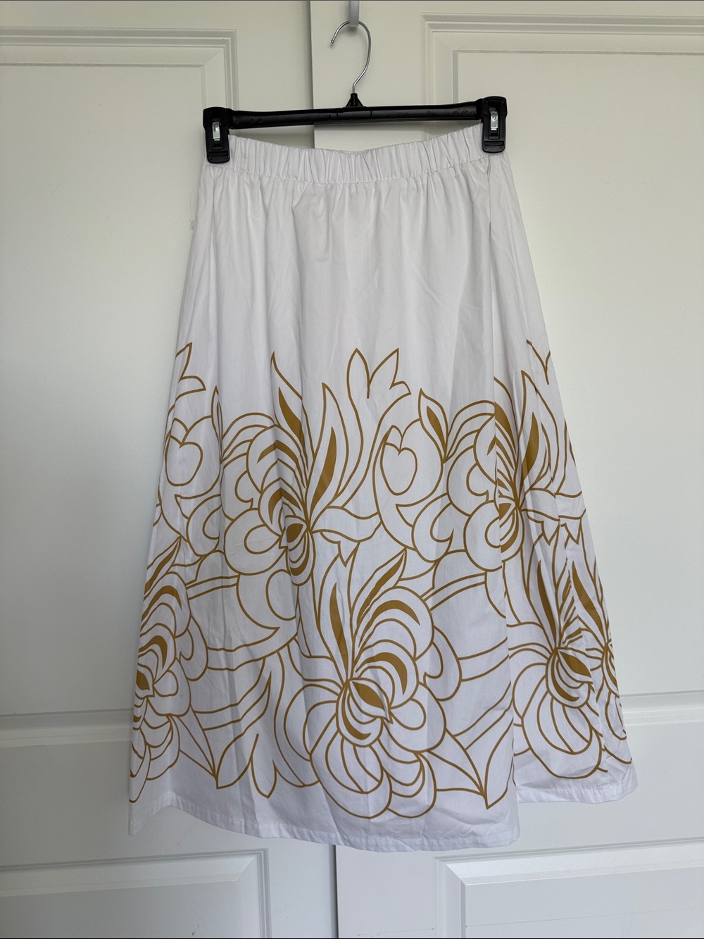 AVEC LES FILLES | White A-Line Skirt with Gold Floral Print.